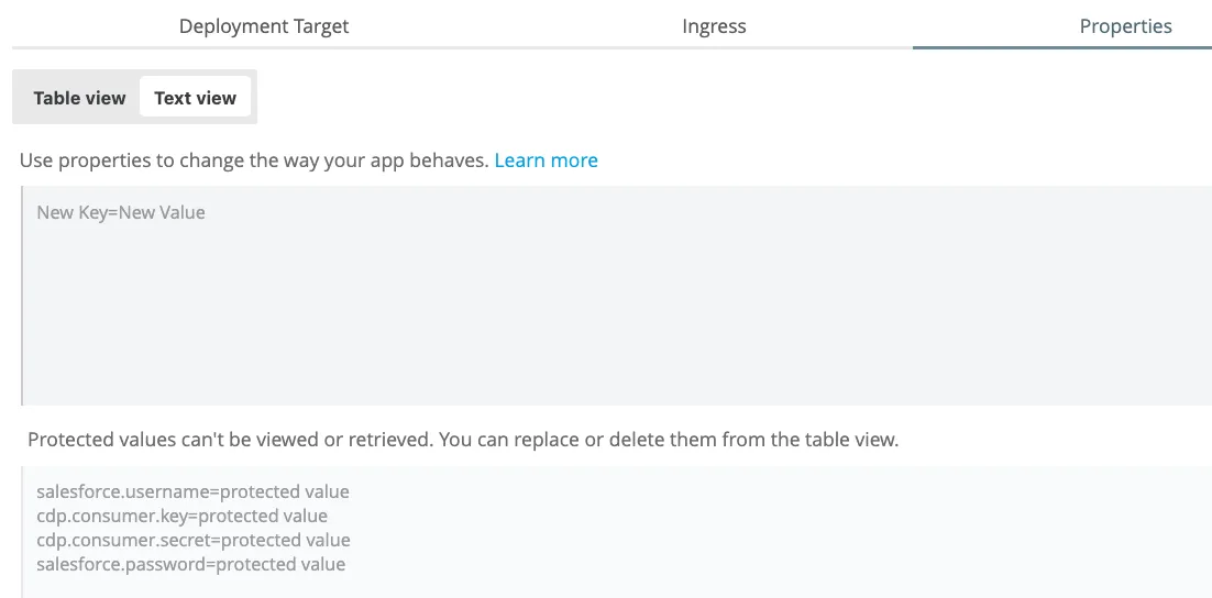 Properties tab switched to Text view, with existing protected Salesforce and Data Cloud values below